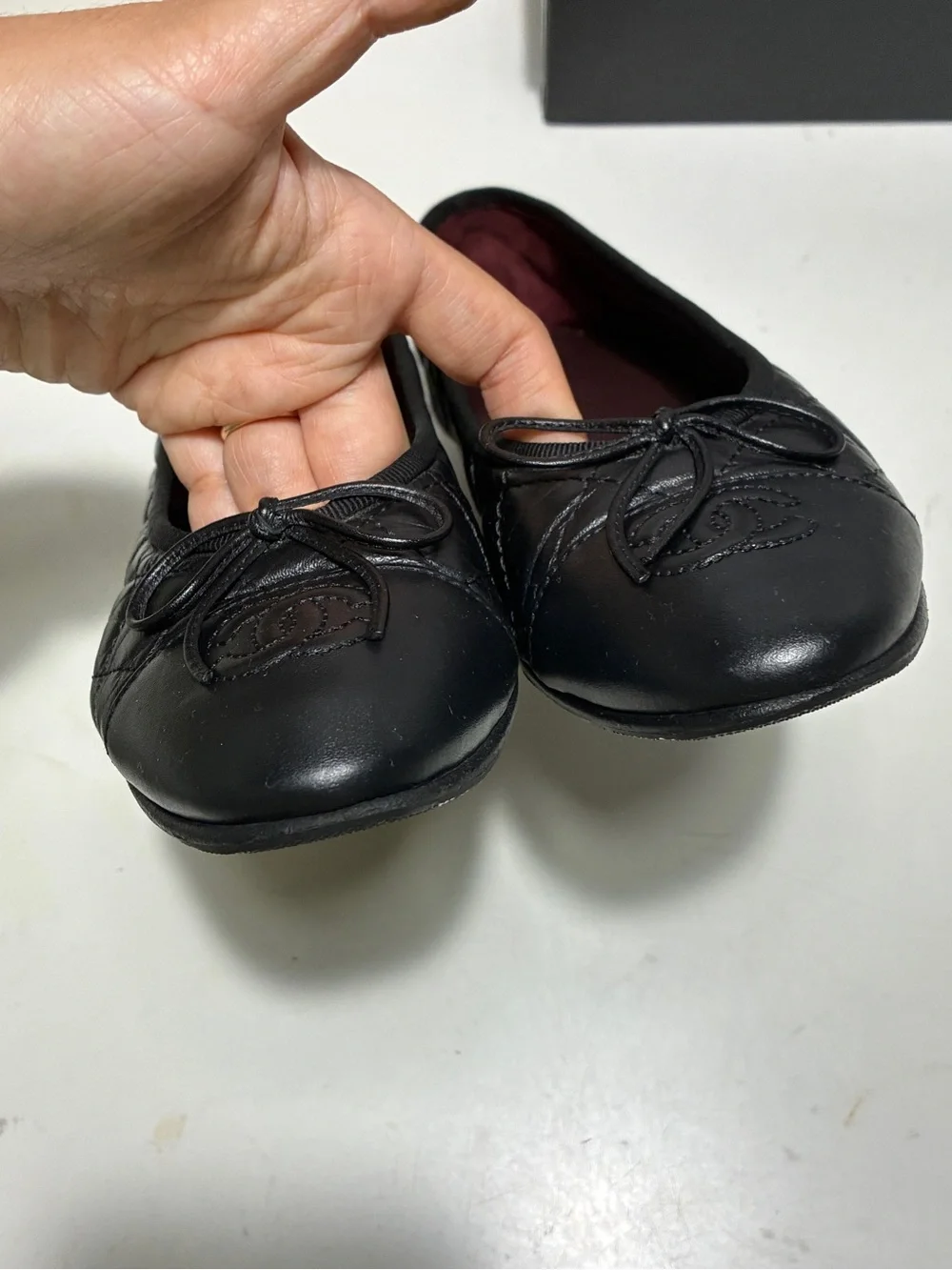 CHANEL Black Quilted Leather Ballet Flats with CC Medallion
